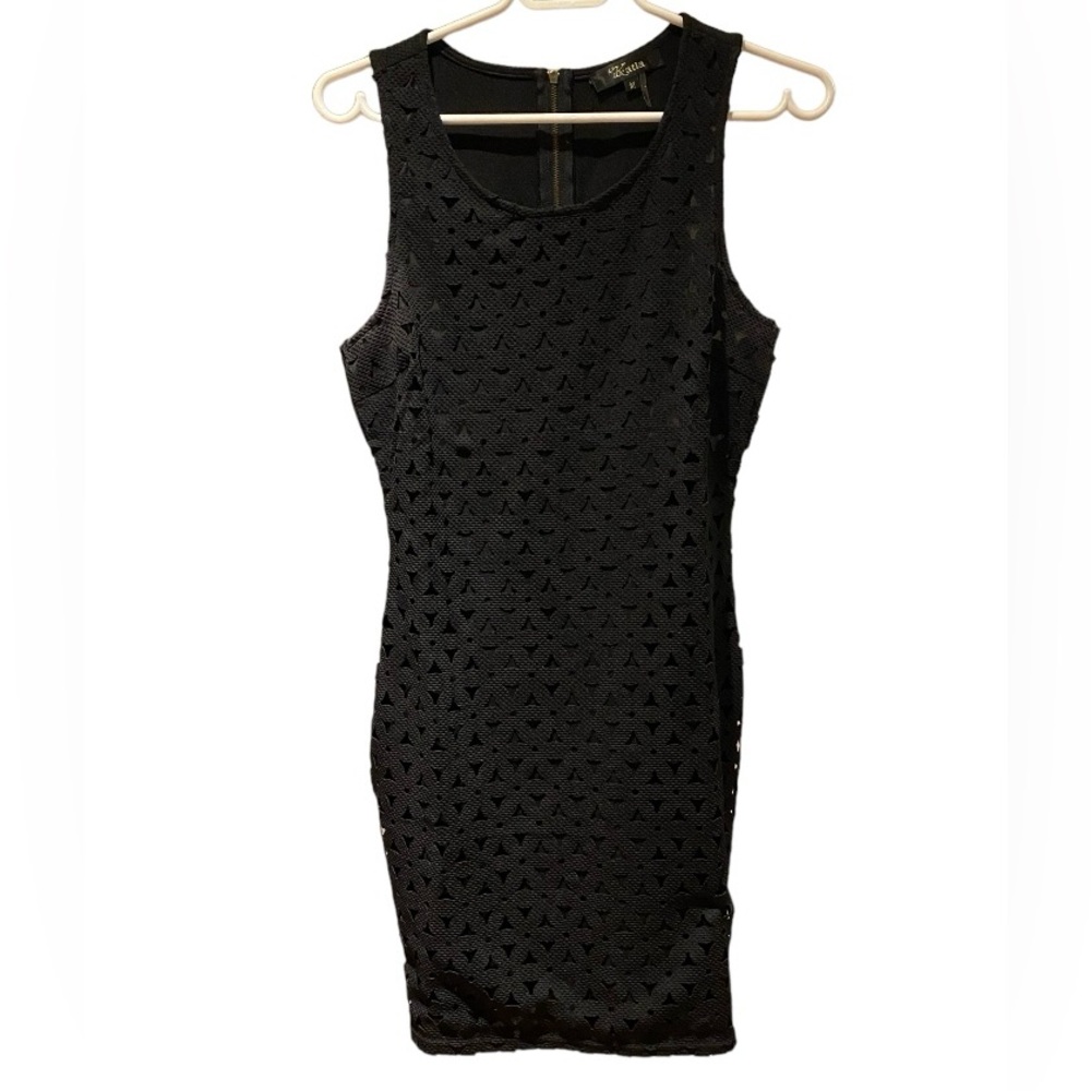 Katia black lace dress with cut outs and zip up back . Size medium